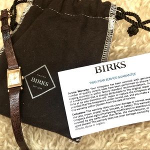 Birks vintage 18k gold and lizard watch